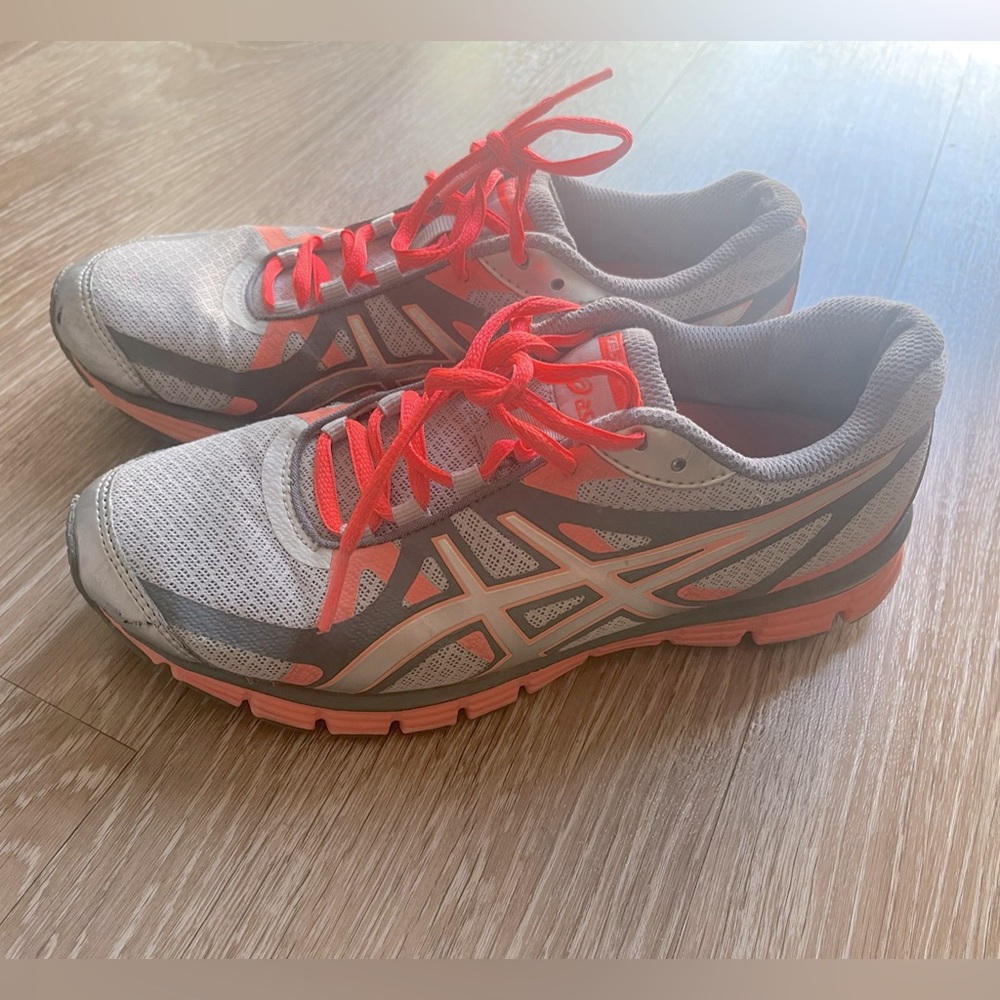 Neon Asic Tennis shoes. Size 7. Barely worn. Great condition